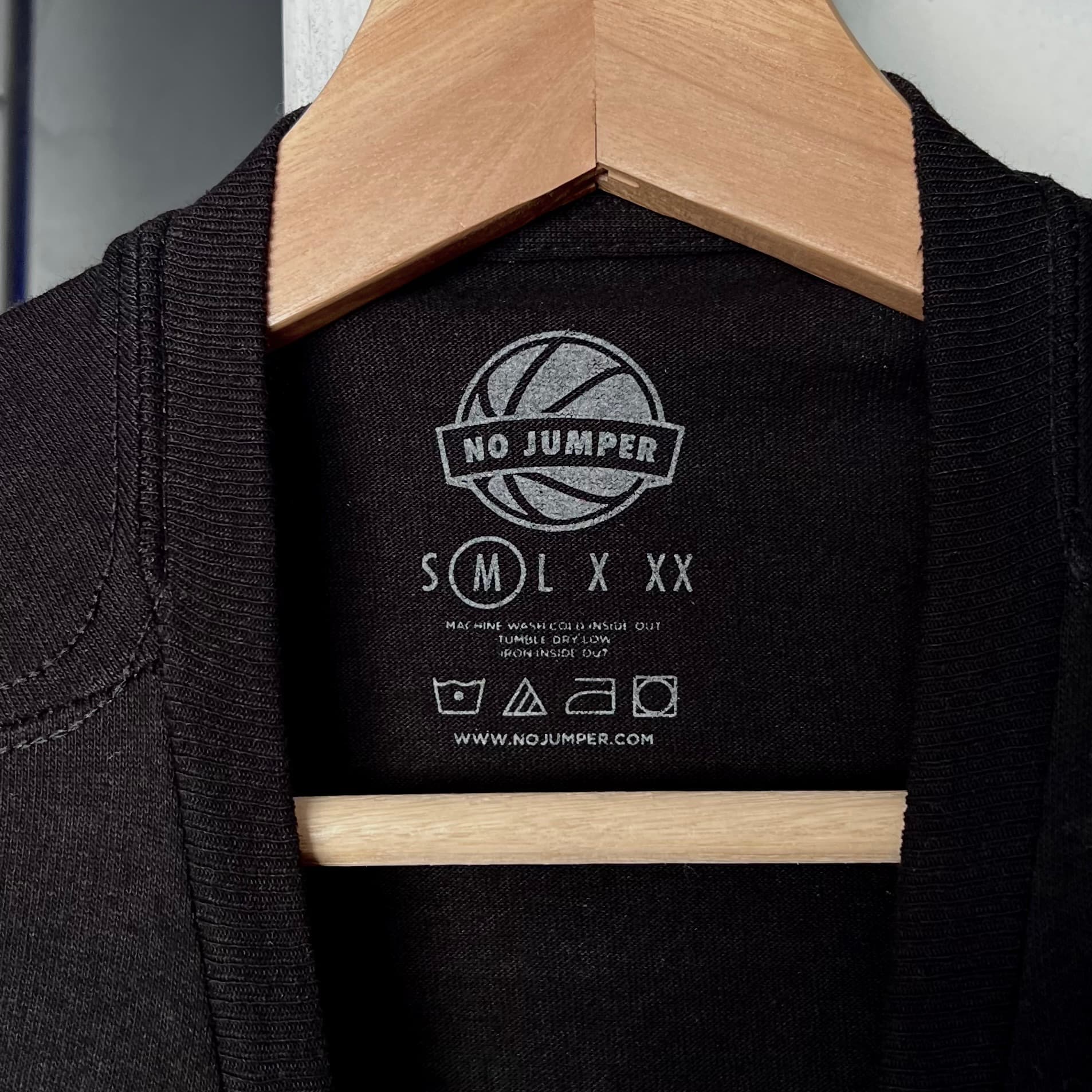 Screen printing carousel loaded with custom t-shirts for bulk order