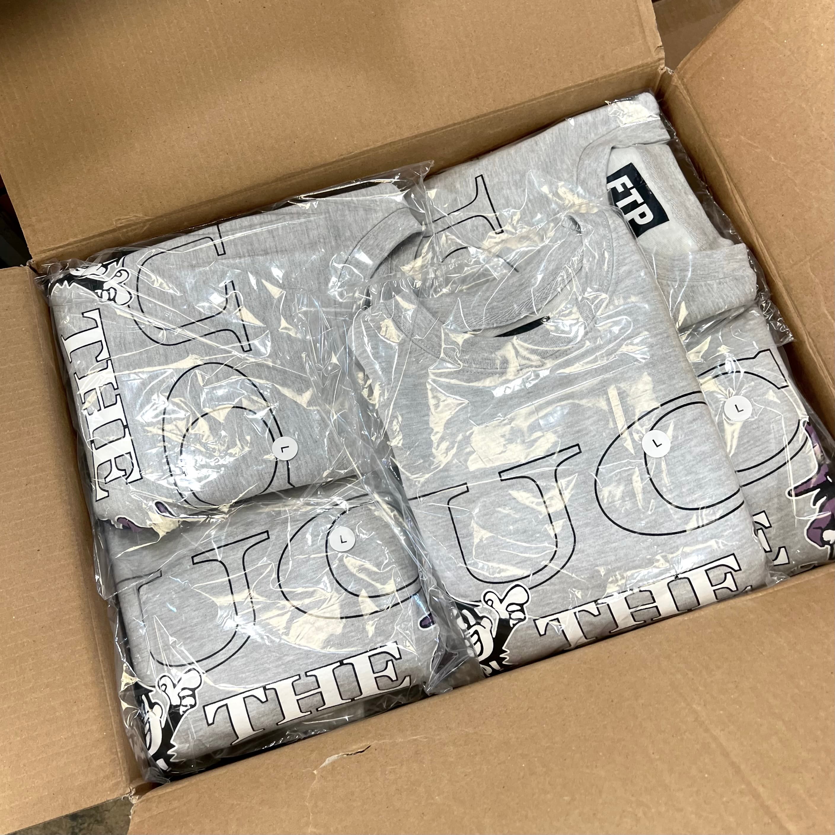 Close-up of screen printing ink being pushed through mesh