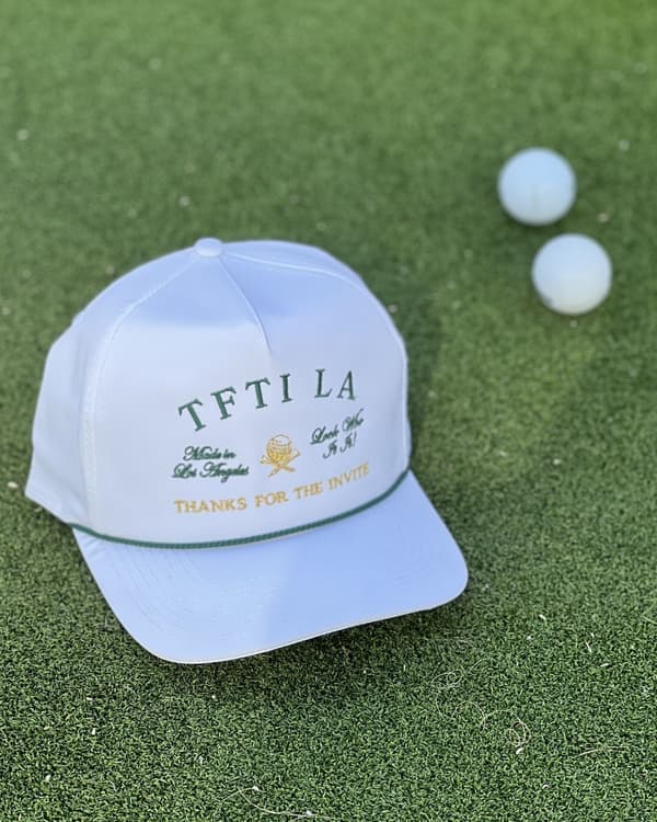 Multi-position green and gold embroidery on a white rope golf cap