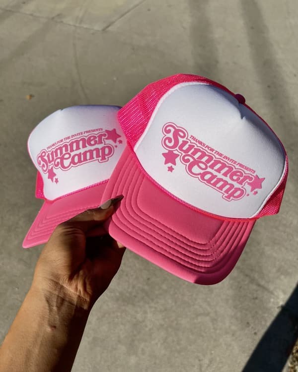 Tone-on-tone retro script print on pink foam trucker hats