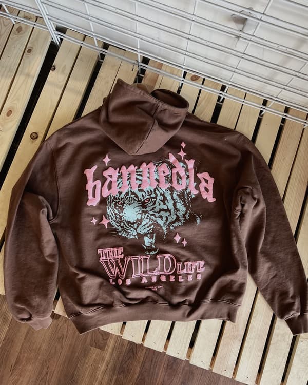Two-color tiger back print on a garment-dyed brown hoodie